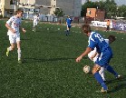 Дмитрий Рура в борьбе за мяч